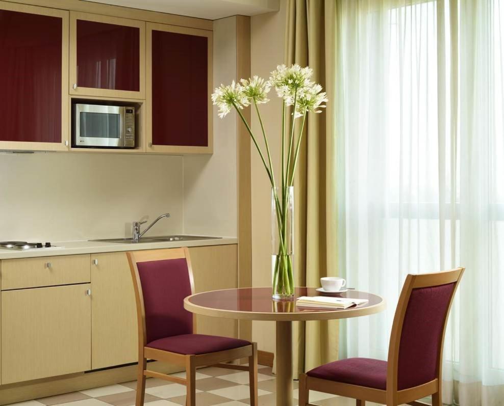 Una Hotels The One Milano Hotel & Residence San Donato Milanese Exterior photo